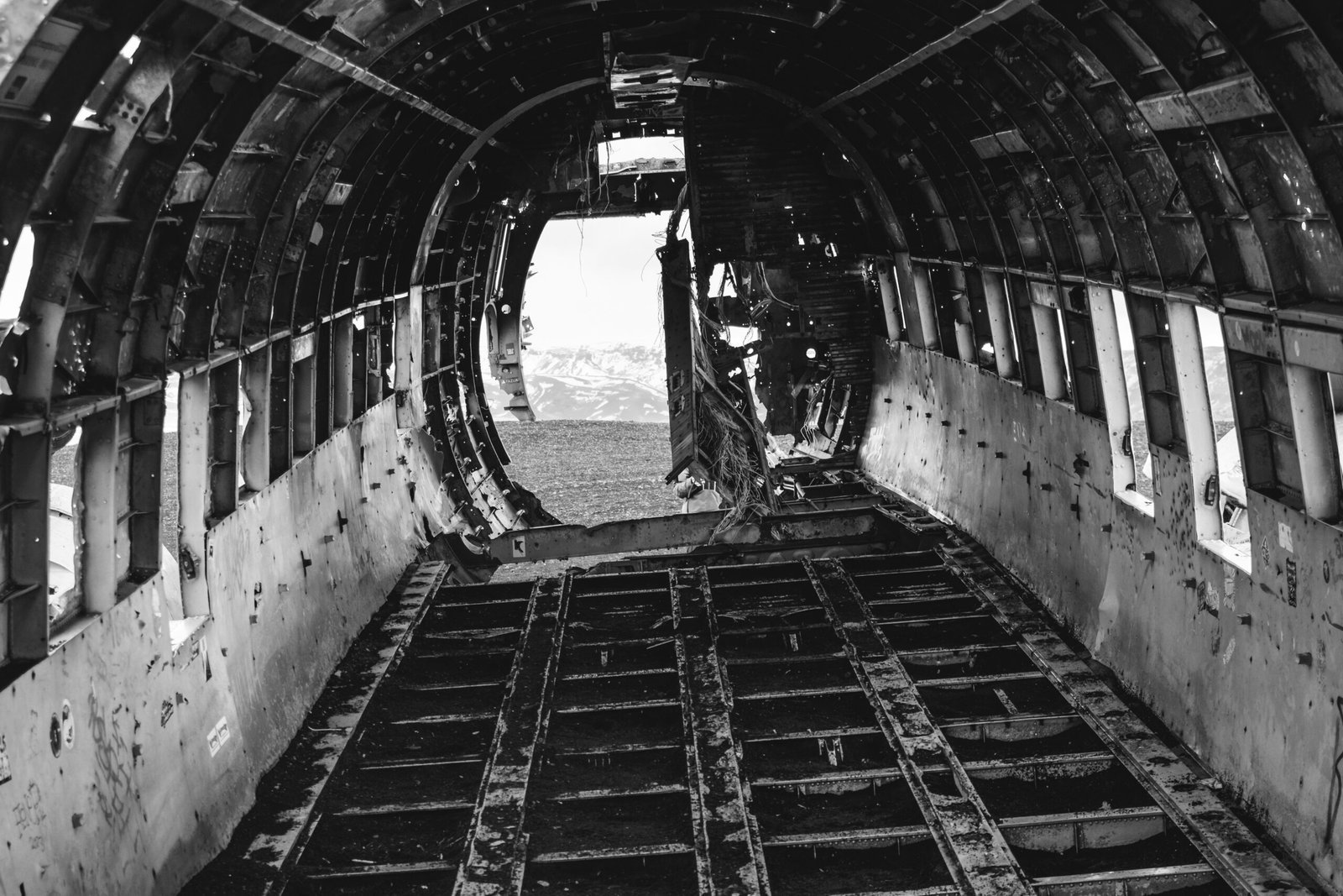 a black and white photo of the inside of an airplane